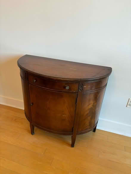 Photo of free Rounded mahogany table (Harbor East) #1