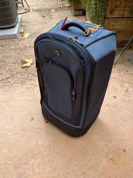 Photo of free Rolling suitcase (Saratoga Herriman Ave) #1