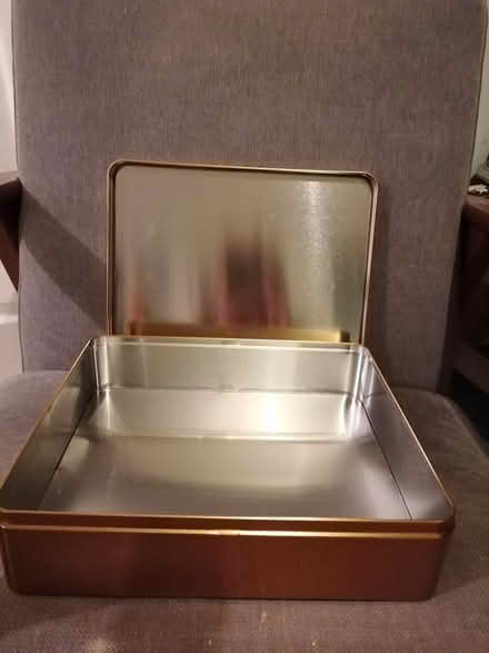 Photo of free Very shiny gold coloured tin (Didcot, Ladygrove, OX11) #2