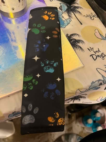 Photo of free Paw print seat belt cover (Long ditton) #1
