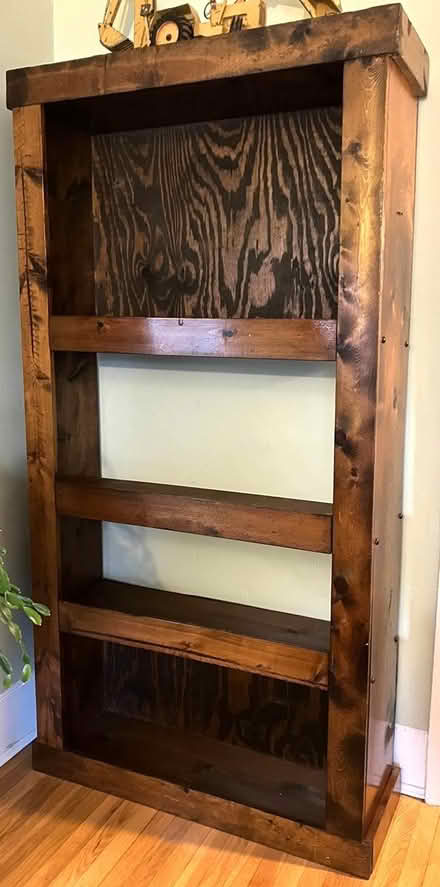 Photo of free Tall wood shelf unit (Downtown ITH) #1