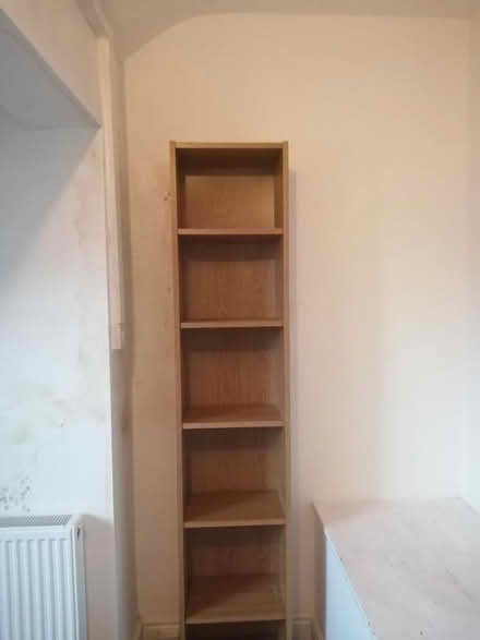 Photo of free Tall bookcase (Prenton, Birkenhead) #1