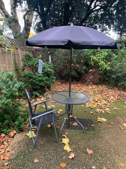 Photo of free Glass topped garden table with umbrella ☂️/ parasol (Bow E3) #1