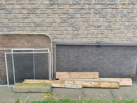 Photo of free Door and window screens (Next to the garage.) #1