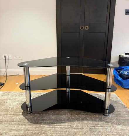 Photo of free Black tempered glass TV stand (Chelsea SW3) #1