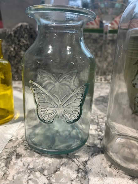 Photo of free Selection of four pretty bottles for flowers. (Wokingham RG40) #1