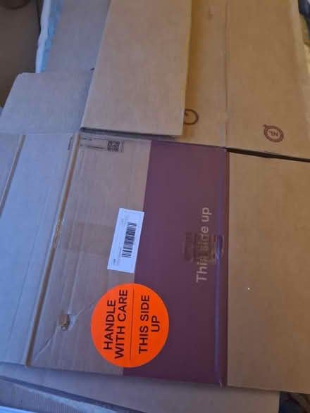 Photo of free 12 moving boxes packed down (SW12 Balham) #1
