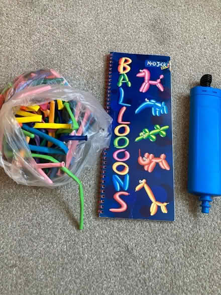Photo of free Modelling balloons, pump and book (Worcester Park) #1