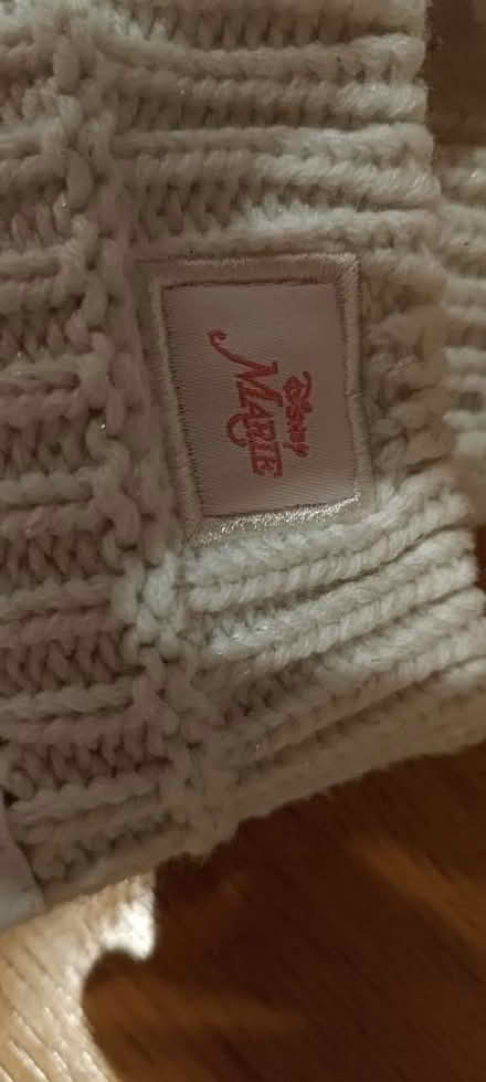 Photo of free Baby hat - Disney Marie pom pom with embroidered face (Westbourne Park W11) #3
