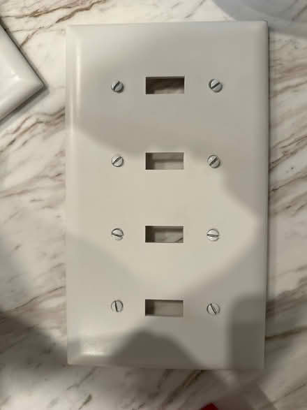 Photo of free white Plastic Light Switch Covers (Lake Claire) #1