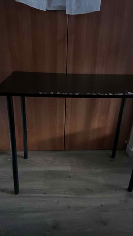 Photo of free Black table with imperfections (LS5) #1