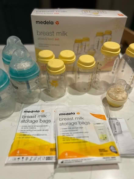 Photo of free Medela milk store & feed set + baby bottles (Timperley WA15) #1