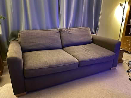 Photo of free Grey three seater sofa (GU8 5QB) #1