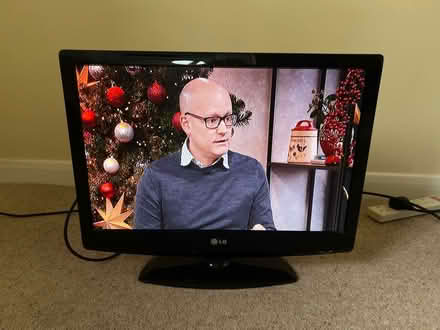 Photo of free 22” TV with remote (Knotty Green HP9) #1