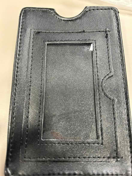 Photo of free Black phone cover i think (w2 2es) #1