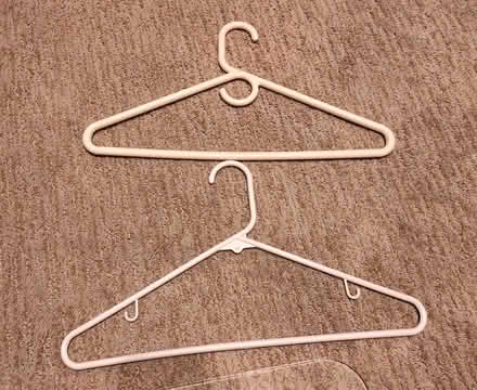 Photo of free Lot of plastic clothes hangers (Carlsbad) #2