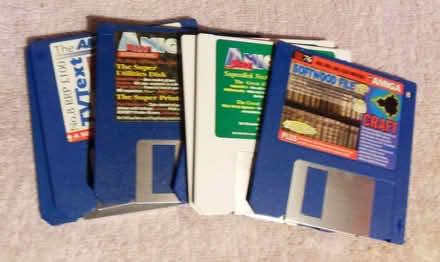 Photo of free Amiga disks and storage box. (Langley SL3) #1