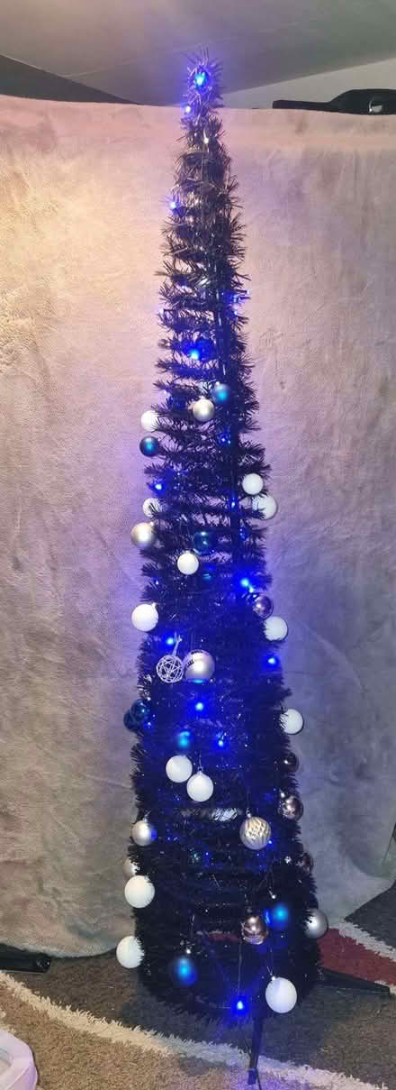 Photo of free 6 foot Black pre-decorated Christmas tree inc lights (Whittlebury NN12) #1