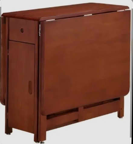 Photo of table that fold up small/ with chairs inside (Seal TN15) #1