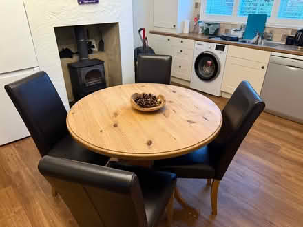 Photo of free Circular Wooden Table and 4 Chairs (Great Bookham) #1