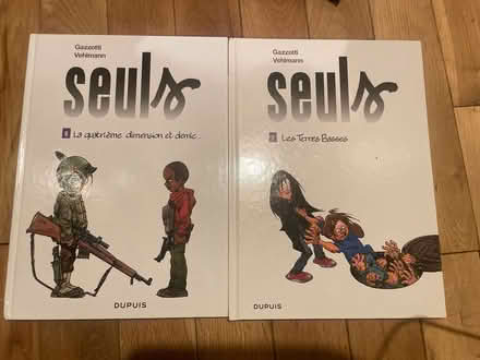 Photo of free 2 French graphic novels (E8) #1