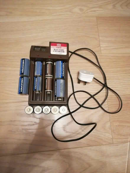 Photo of free Battery charger and batteries (Sutton SM2) #1
