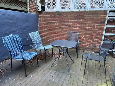 Photo of free Patio table and 4 chairs (Dupont Circle) #1
