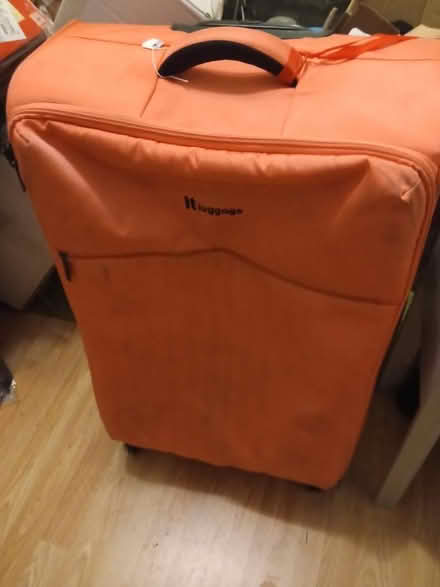 Photo of free Large suitcase (Sutton Manor WA8) #1