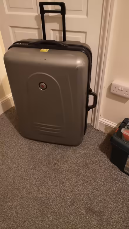 Photo of free Large wheeled suitcase (DN21, Gainsborough) #1