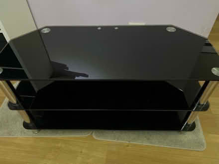 Photo of free Black and silver glass Tv stand 105cm by 45cm by 54 cm high (Surrey Heath GU15) #1