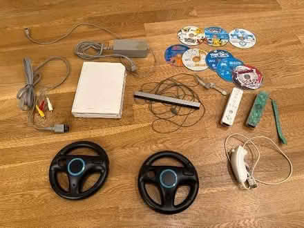 Photo of free Wii, 2 controllers, 8 games (West Torrance) #1