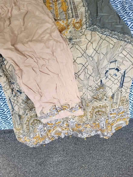 Photo of free Suit (Woodley RG6) #1