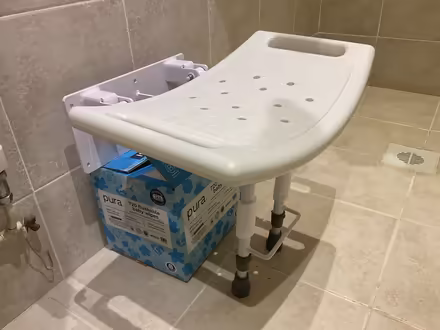 Photo of free Wall-mounted, fold-up shower chair (new) (Lodge Moor S10) #1