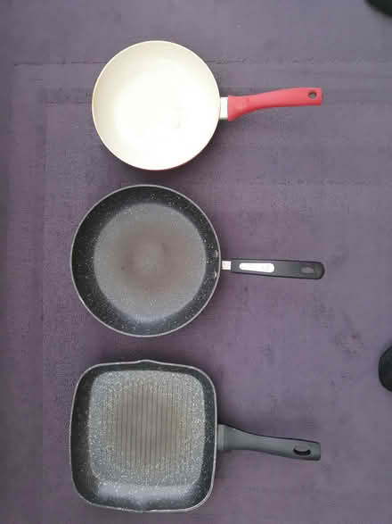 Photo of free Frying pans. Should suit most hobs, including Induction. (Heswall CH60) #1
