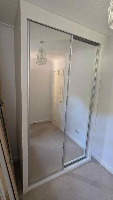 Photo of free Built in cupboard with sliding mirrored doors. (East Lavant PO19) #1