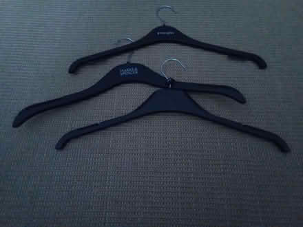Photo of free Plastic coat hangers (GU14) #1