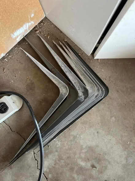 Photo of free Shelving brackets & particle board (Walnut Hills) #1