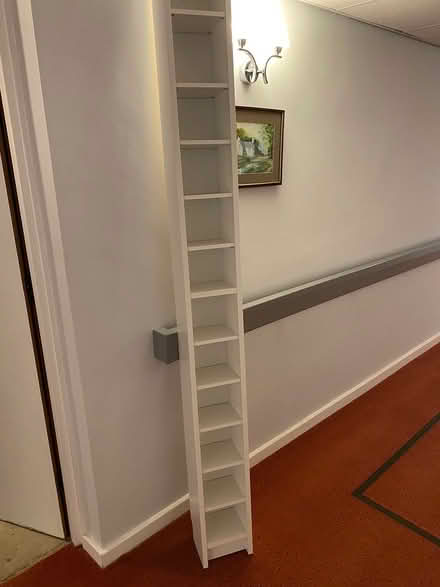 Photo of free Tall cd rack white (Bn85bn) #1