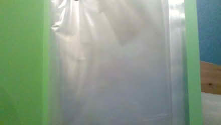 Photo of free A 4 folder with clear sleeves attatched (Globe Town E2) #1