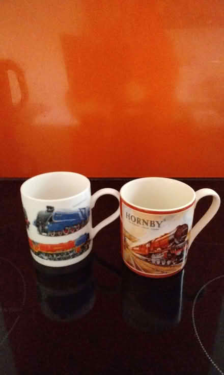 Photo of free Train themed mugs mismatched pair. (Fazakerley L11) #1