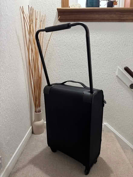 Photo of free Black medium 4 wheel suitcase (Dunfermline KY11) #2