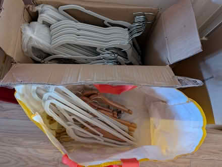 Photo of free Velvet adult hangers and child wooden hangers (Emerson Park RM11) #1