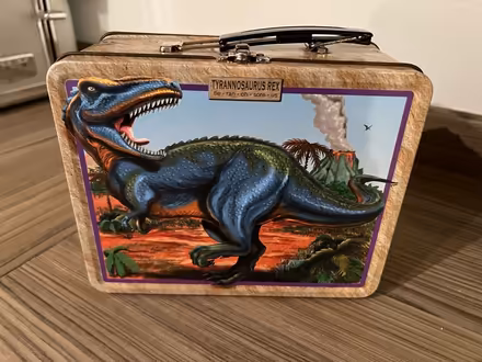 Photo of free Tin of toy dinosaurs (CR3 Caterham on the hill) #1