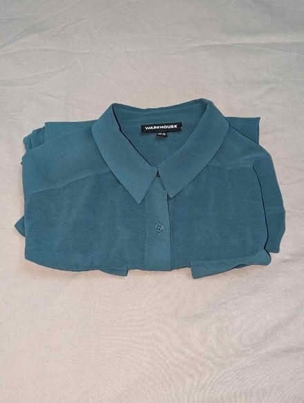 Photo of free Turquoise shirt (Millwall E14) #3