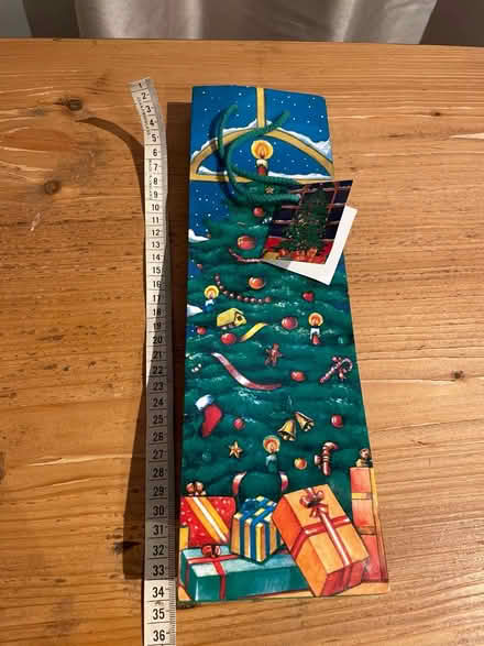 Photo of free Christmas tree bottle gift bag (201 Streatham High Road) #1