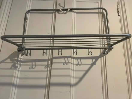 Photo of free Metal shelf with hooks (Fulham Palace Road W6) #2