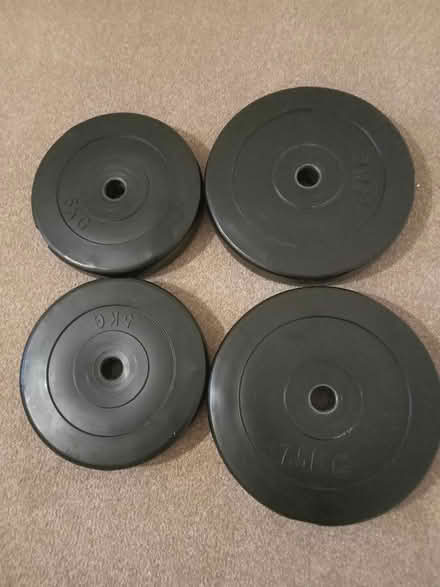 Photo of free Vinyl weight plates (Taw Hill SN25) #1