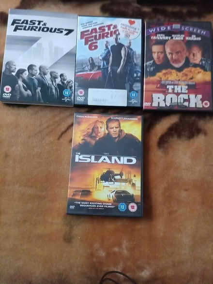 Photo of free 4 action dvds (GU14 9rl) #1