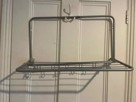 Photo of free Metal shelf with hooks (Fulham Palace Road W6) #3