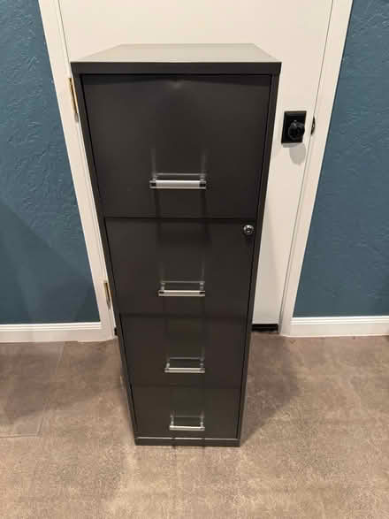 Photo of free Locking file cabinet (Castro Valley) #1